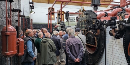 The group in front of the boiler